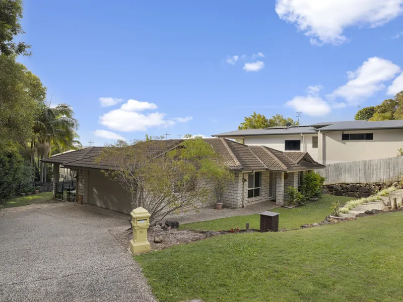 Nestled privately at the end of the cul-de-sac