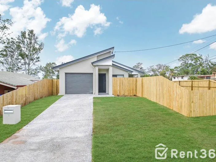 MODERN 4-BEDROOM 2-BATHROOM TWO YEAR OLD FAMILY HOME WITH AN EXTRA LARGE YARD IN THE HEART OF LOGANLEA