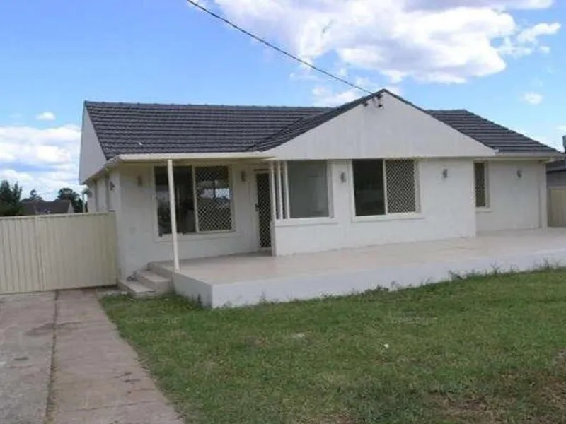 FULLY RENOVATED HOME WITH TILED FLOORS THROUGHOUT