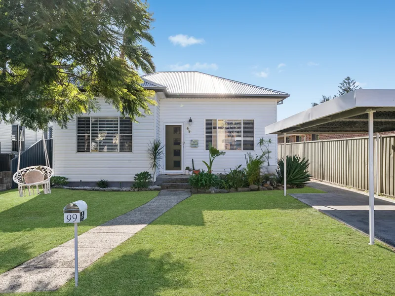 Single level beachside home with stylish modern updates
