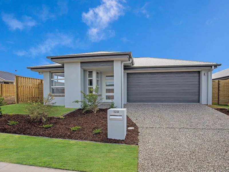 MODERN 4BR HOME IN FAMILY FRIENDLY EDENS CROSSING. CLOSE TO SHOPS, PARKS & SCHOOLS