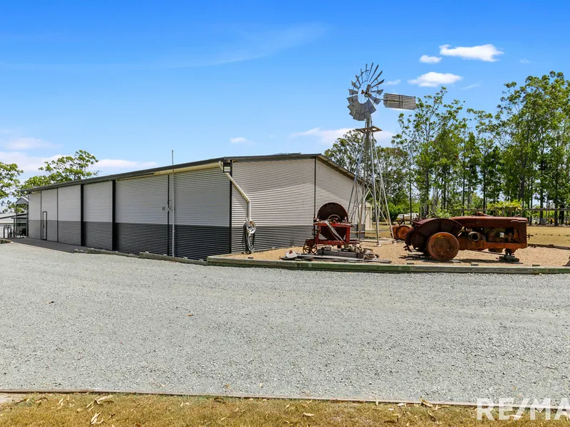 2 ½ acre River Front Home with Private Pontoon