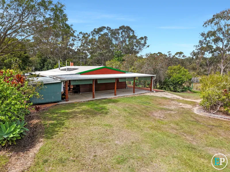 Beautifully established 1.2ha property with Western Red Cedar Home!