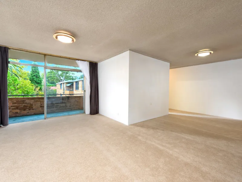 SIZABLE LIVING SPACE WITH NORTH FACING BALCONY !!!