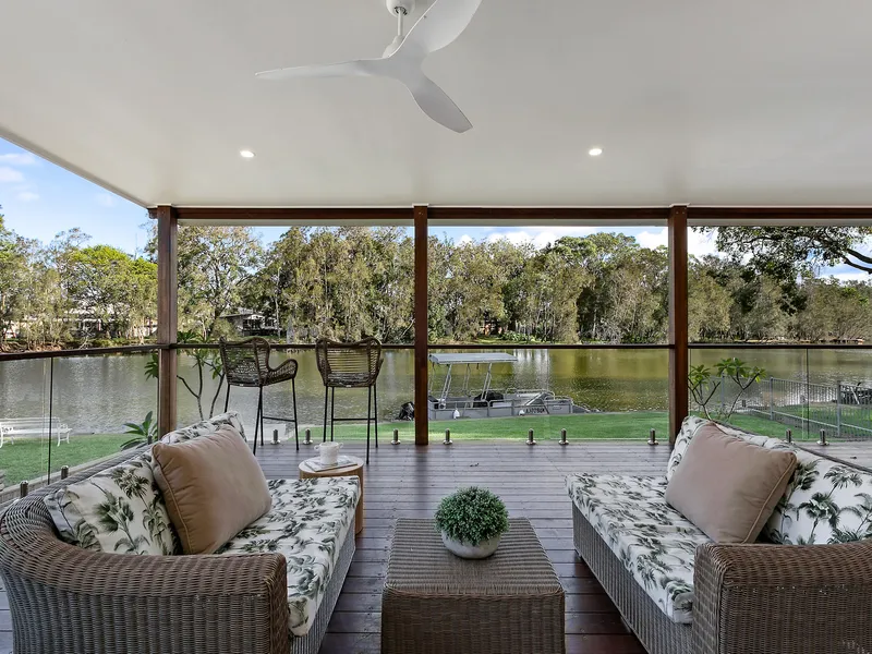 Embrace the serene allure of riverfront living on a 1,347sqm parcel