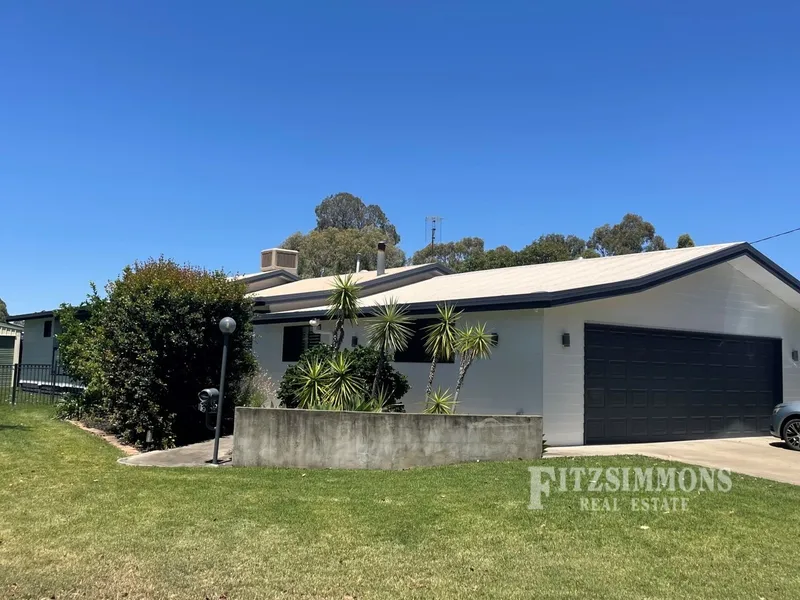 IMPRESSIVE FAMILY HOME COMPLETE WITH ALL THE BELLS AND WHISTLES