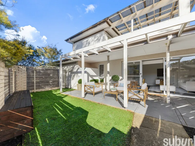 Ground floor end unit, with large courtyard, and double garage