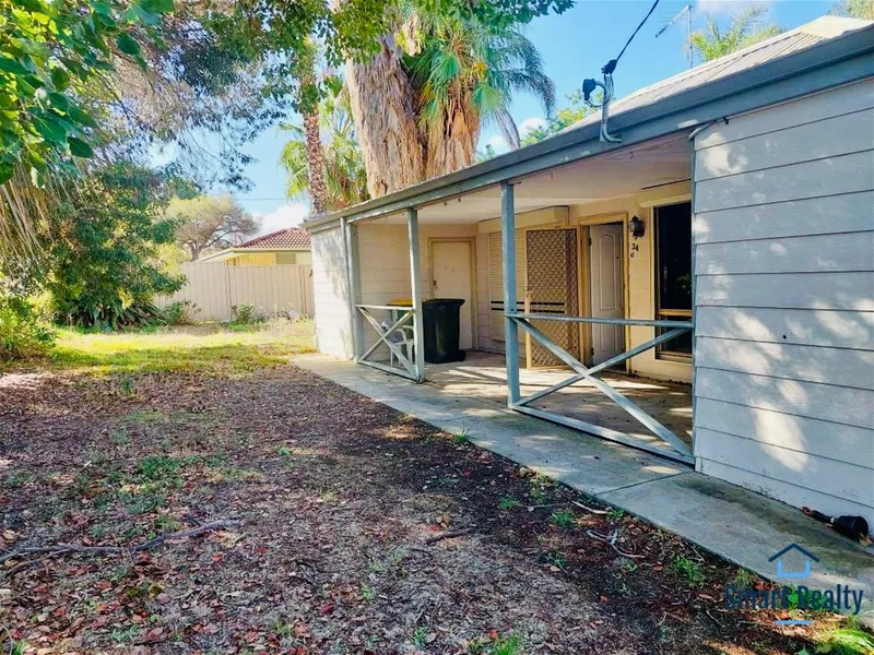 Quaint Character Home on quiet street with huge backyard!