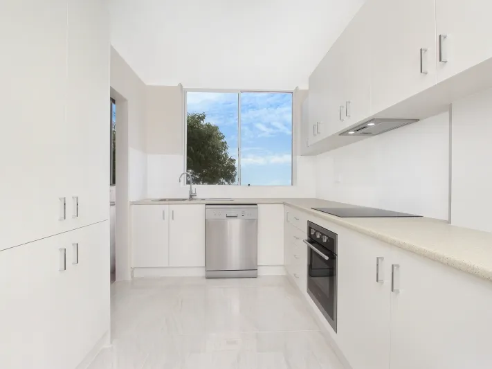 DEPOSIT TAKEN! Conveniently Located, Renovated 3 Bedroom Apartment With a Lock Up Garage!