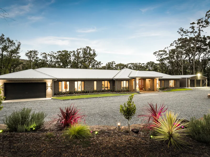 UNPARALLELED FAMILY LUXURY ON 115 ACRES