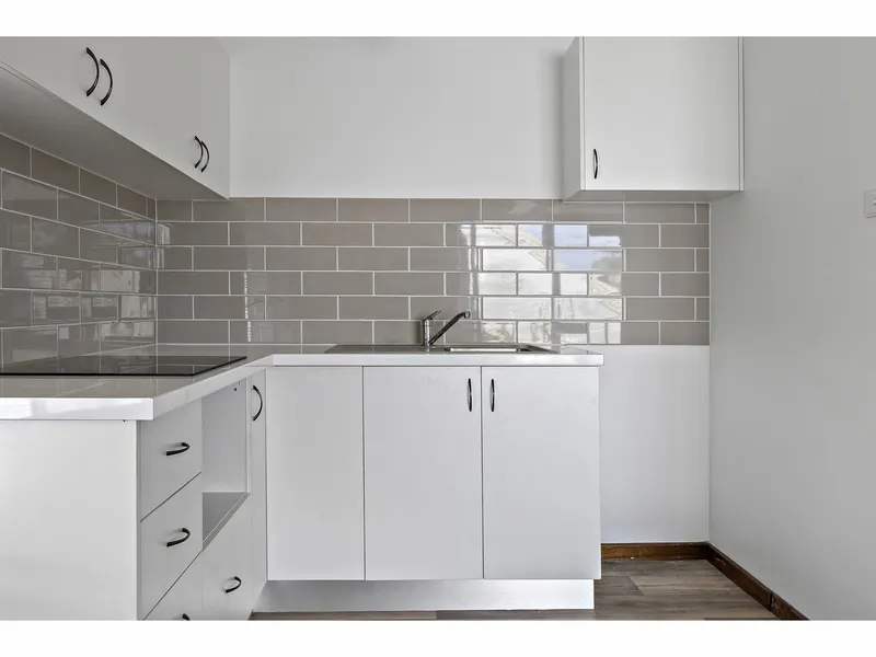 FRESHLY RENOVATED REAR GARDEN UNIT - WATER AND YARDS INCLUDED