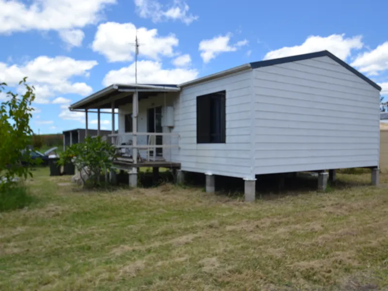 ½ ACRE BLOCK WITH 3 BR COTTAGE - QUIET PEACEFUL SURROUNDS