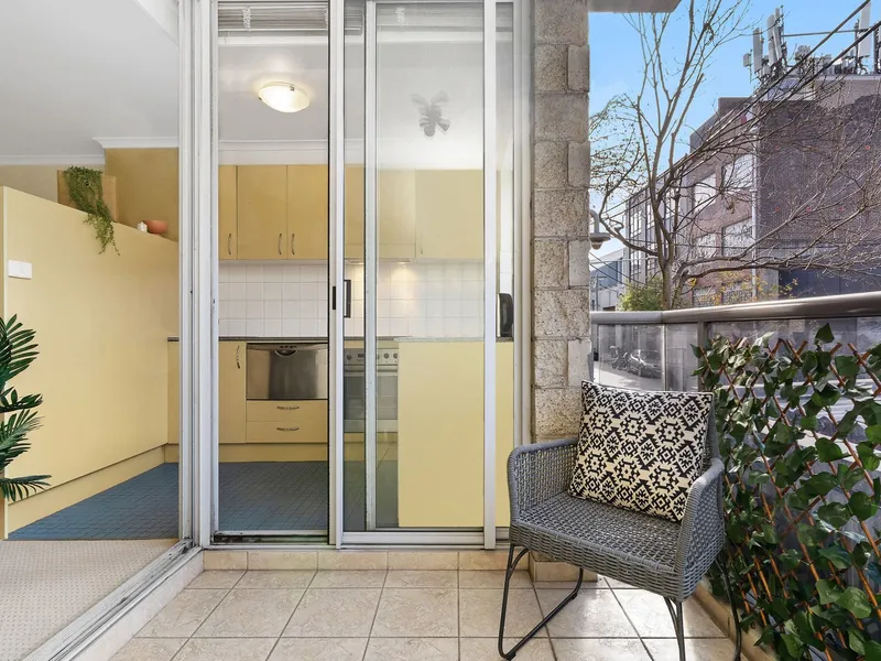 Bright unfurnished modern one bedroom with balcony and security car space.
