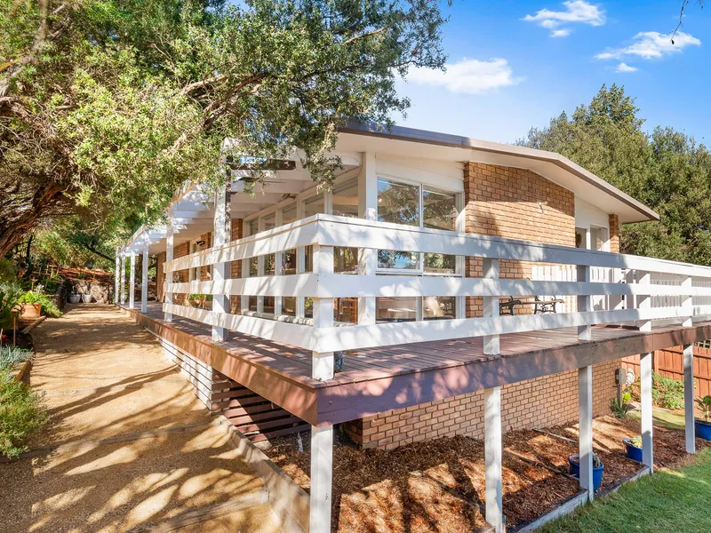 Private, coastal sanctuary in treed setting