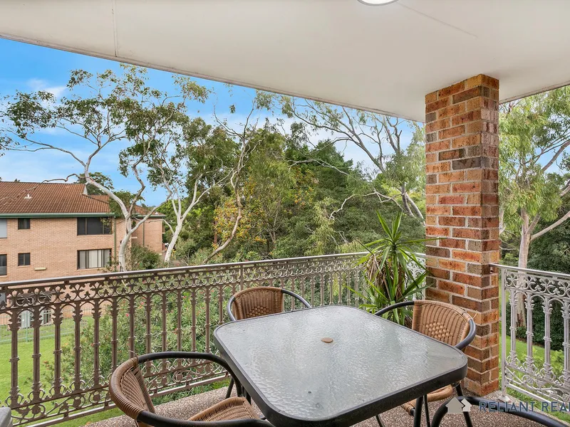 Immaculate Top Floor Unit