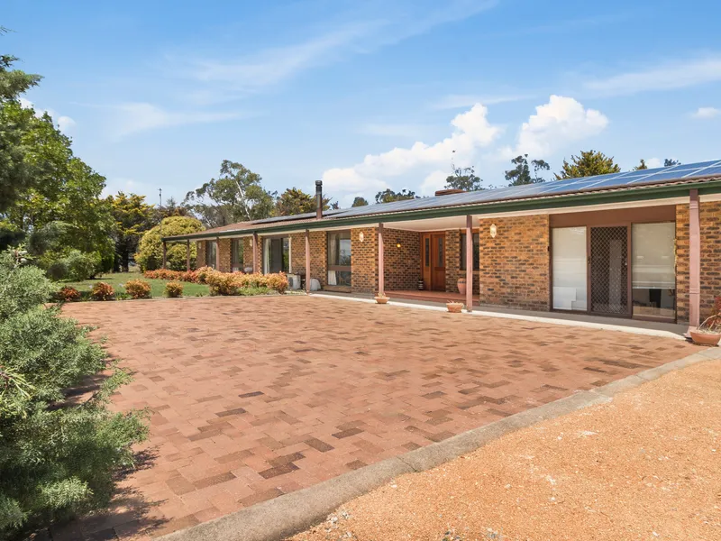 RARE ACREAGE LIVING WITH EXPANSIVE FAMILY HOME