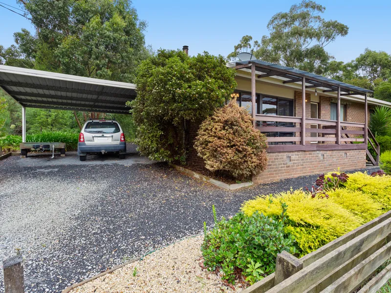 WELL KEPT BRICK HOME WITH BAY VIEWS