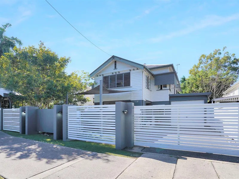 CONTEMPORARY QUEENNSLANDER  IDEAL ENTERTAINER WITH HOME OFFICE POTENTIAL