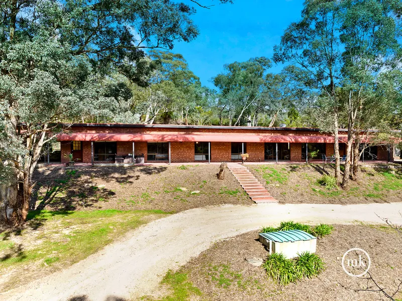 Two Homes-One Roofline And Three Acres Of Land!
