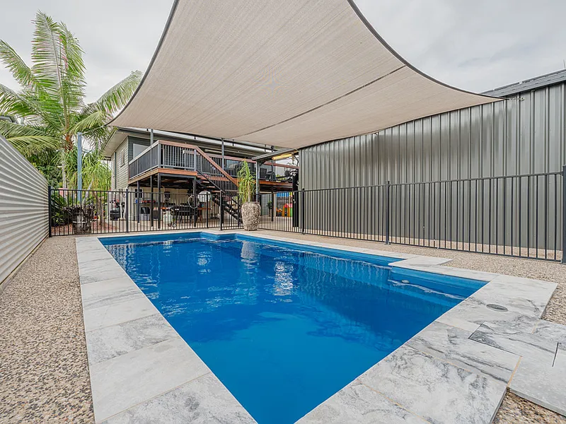 Ultra Modern Industrial Look home with Amazing Shed & Sleek Pool!