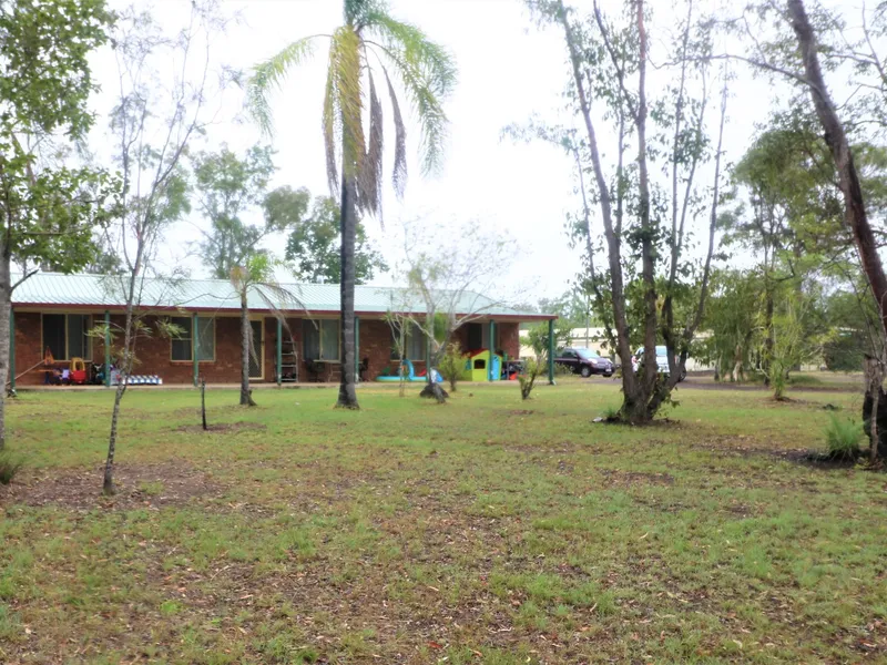 5 BED BRICK ON OVER 1 ACRE TOWN WATER