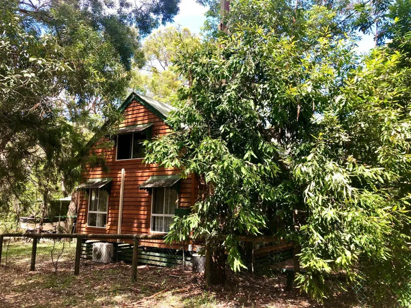 Craftsman built set among the gum trees.