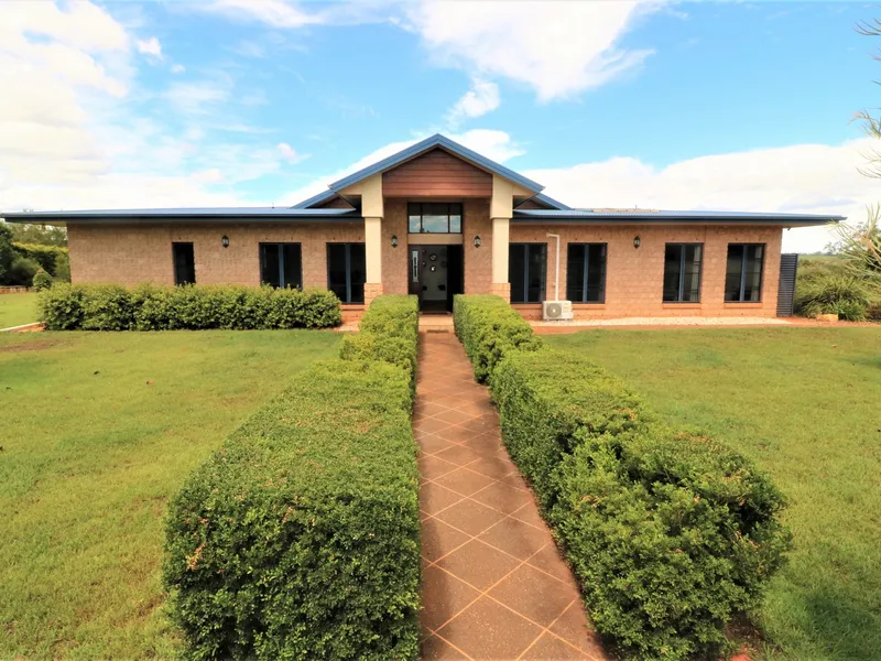 EXECUTIVE STYLE HOME ON 23 ACRES