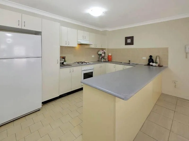 Large apartment located close to buses, trains and shops.