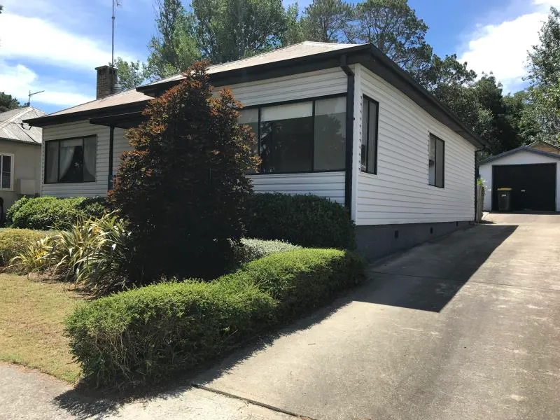 Character cottage on secured lot, located close to The River