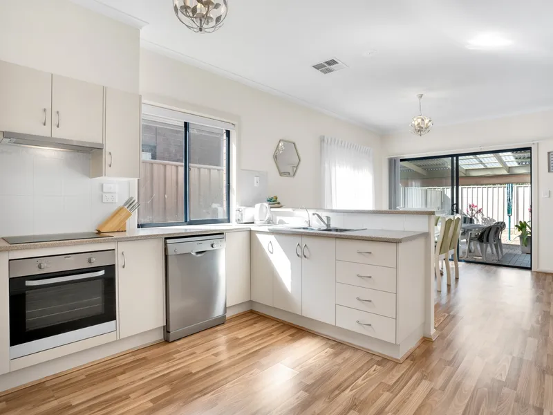 What a stunner! Courtyard living with style & convenience!