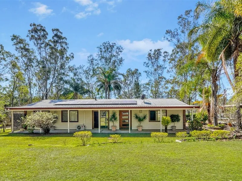 Country Homestead with Refreshed Modern Kitchen on 5.3 Acres!