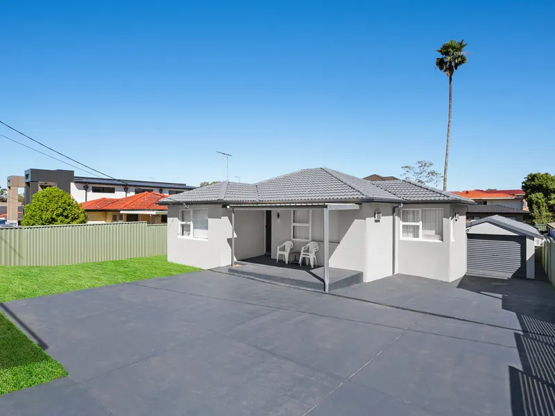 RENOVATED SINGLE LEVEL BRICK HOME