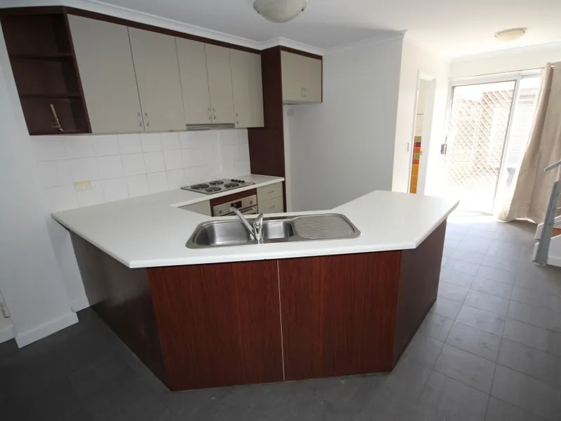 VERSATILE TWO BEDROOM TOWNHOUSE IN SECURE POPULAR COMPLEX!