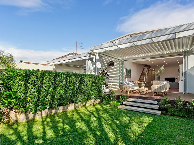 Oversized 4-Bedroom Residence in Ultra-Coveted Beachside Address