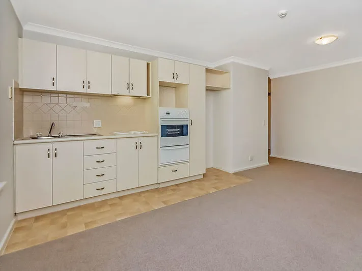 Enjoy elevated views from this first-floor apartment.