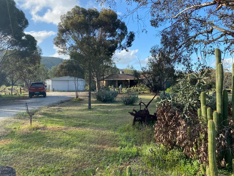 5 acres , superb views and serenity , comfy home, big shed, affordable.