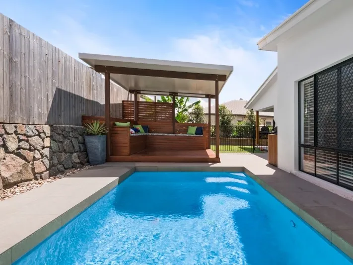 BEAUTIFUL FAMILY HOME, POOL, SOLAR, DUCTED A/C, ACROSS FROM PARK, WALK TO SCHOOL!