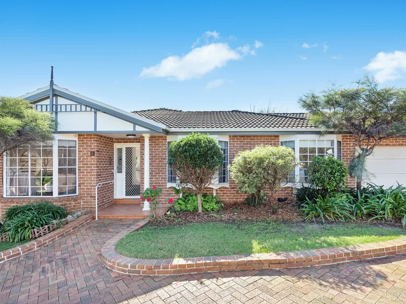 Peacefully positioned haven promises ideal easy care living.