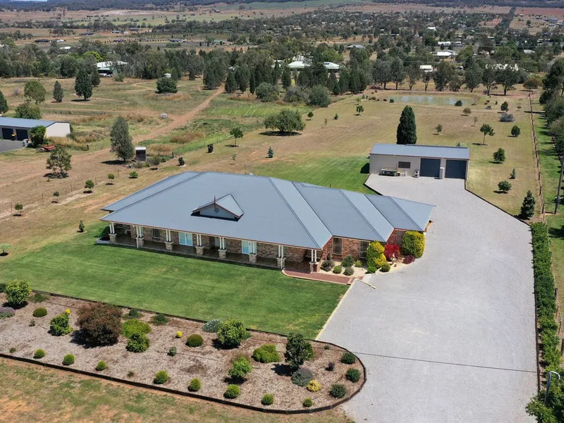 IMMACULATE HOME ON 3 ACRES WITH STUNNING OUTLOOK