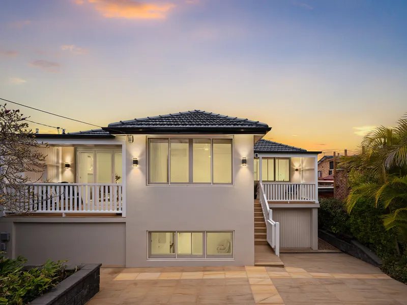 Contemporary family abode footsteps from waters edge
