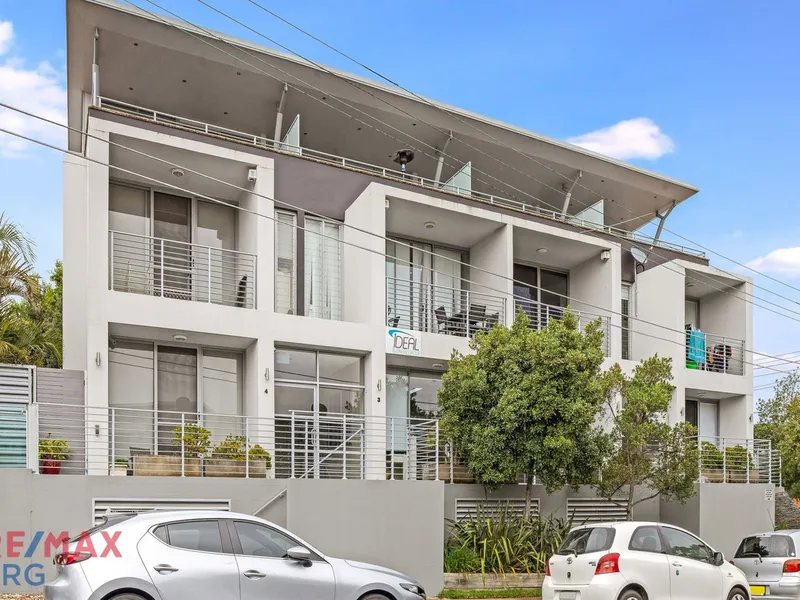 Double Brick Tri-Level Townhouse with Home/Commercial Office Potential