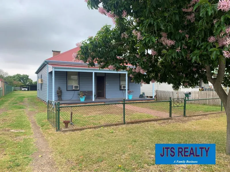 Solid Weatherboard Home 