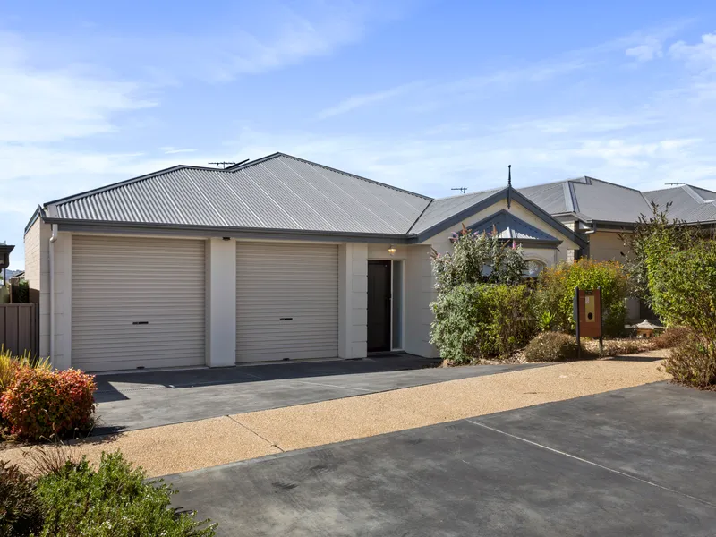 Picture perfect living in the ideal Hills locale….