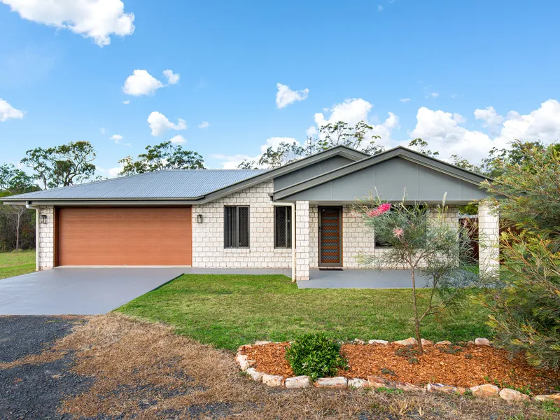 NEAR NEW 4 BEDROOM HOME ON 5 ACRES- PRICED TO GO !!