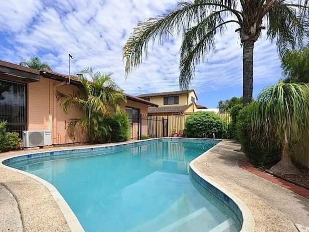Spacious living alongside a Pool