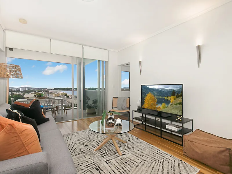 Top Floor River Views – Stylish Portside Living