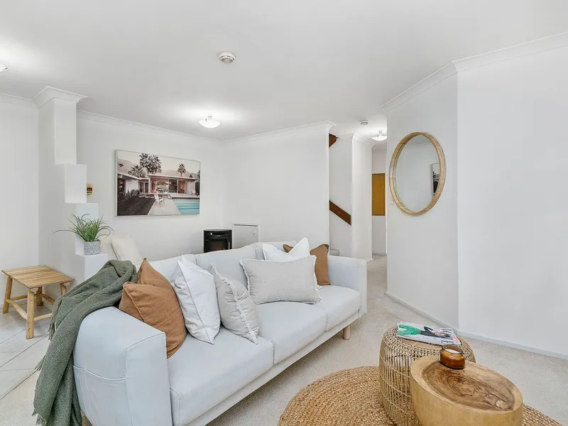 Townhouse Temptations! It Feels Like Home - The Perfect Investment into YOUR FUTURE- The perfect “lock-up-and-leave” property