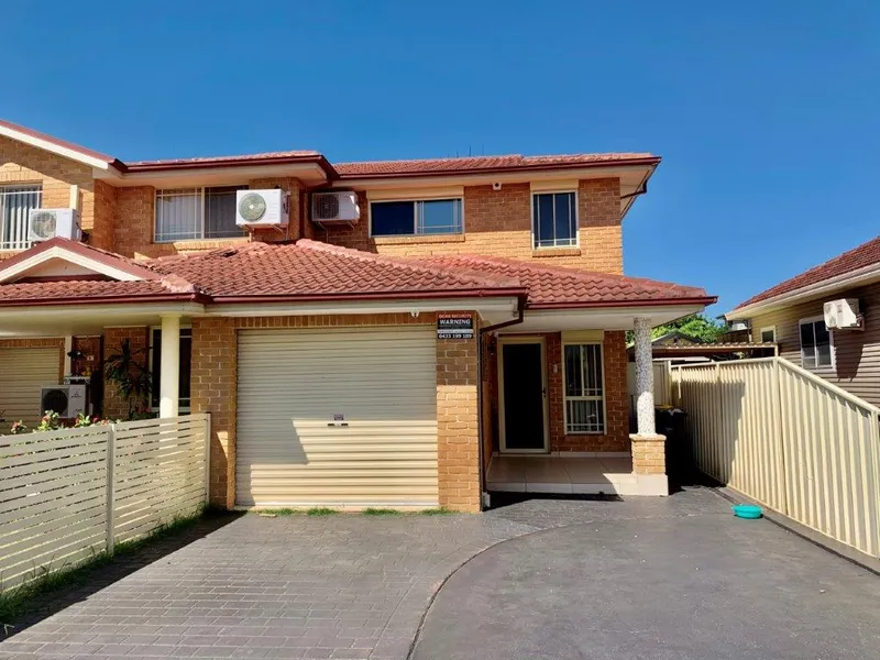 Beautiful Near New Modern Triplex 