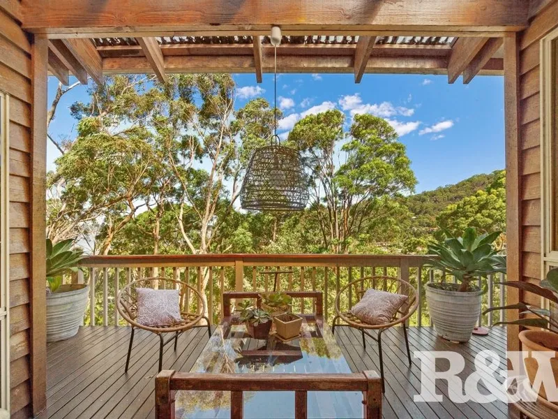 Peaceful Family Home with Filtered Waterviews