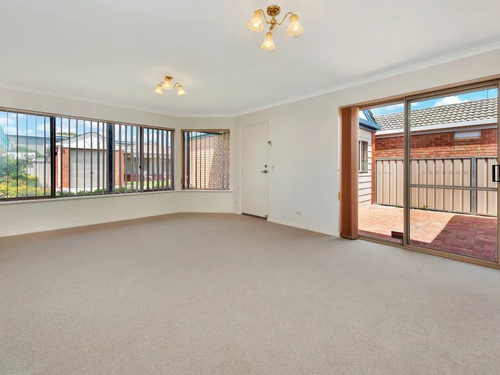 Lovely freestanding unit with north facing backyard located on the village boundary